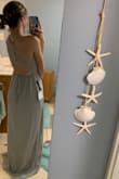 I was pretty skeptical ordering this because I found a lot of reviews saying that it was a bit too big. I severely debated whether or not I should size down to an XS, but I'm glad I didn't. This dress fit me perfectly! Suuuuper flattering as well, HIGHLY recommend! - Emma B.