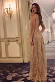 This dress was amazing all the looks where on me, it feels good, I'm not giving a 5 because the sequins go everywhere but otherwise, I don't know how many times I said thanks for the compliment about the dress. - Maria E.
