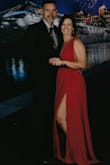 This dress fit my body very well. I never felt uncomfortable or concerned I would reveal to much. The dress stayed on my shoulders without adjustments. It was a bit long but I didn't wear heels. I had many compliments on this dress. I loved the slit on the side. When I would walk the dress would flow. - Angie A.