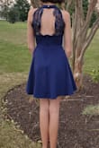 My daughter chose to wear this dress to her first HOCO dance. She is in 9th grade. She looked beautiful! She is petite in size so most things run large on her but this dress fit her nearly perfect. Slightly big but not big enough to have alterations. She said it was very comfortable to wear and felt very confident. - Erin M.