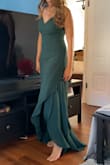 I wore it for a formal outdoor engagement shoot. Looked great on me in my opinion. Very flowy material. I found it flattering. - Maribel M.