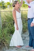 I chose this as my wedding dress, it was perfect for the beach. The quality was insane! I added a belt but as you can see in photos, fit like a glove. Belt and hemming were long alterations needed. No one could tell this wasn't a super expensive dress. - Nicole N.