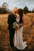 I was searching for a wedding dress for our elopement that wasn't over priced but still bridal looking. This dress was perfect and love that it had a little train. Was curvy in all the right places and such a perfect wedding dress. Highly recommend this dress! - Leslie W.