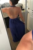 I love this dress. The color is stunning and the fit is great too. I was worried about how revealing it would be since I am small chested there isn't really much to hold the dress in place. I was able to wrap it tight enough to make more of a deep V rather than that 1-inch space that other reviews are talking about. The length is also perfect for me, I am very short so usually, things are too long on me but once I put heels on this dress will be perfect.
I got this dress for a Texas winter wedding coming up and I can't wait to wear it. - Gina G.