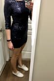 I normally wear an XS in any other Lulus dress but after reading other reviews about it running small I sized up and got the Small and am happy I did. It fits perfectly. It's a little bit shorter than I would care for but it still works and I really do love the dress. It's very comfy and the sequins don't rub around the neckline or sleeves. Plus it's a beautiful color. - Charlene H.