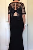 I originally ordered a M but it was a little too large everywhere. Returned it for a S. This one is very snug but I think it's supposed to fit snug. You can see this dress does show a stomach bulge if you have one. Very well made, heavy weight stretch fabric and I love the back detail. I am a senior and wanted something to cover my arms so I made a lace bolero with an open back to show the dress back detail. This dress will be perfect for formal nite for our 50th wedding anniversary cruise. - Arla N.
