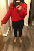 Really unflattering sweater, the torso is so short that anytime I bring my arms up a little bit, it rises above my belly button.  If you're skinny and can wear high waist, this will be fine for you.  The color is red red and not strawberry red like the picture, there is no pink hue at all. The arm pits hang down to the waist.  Just not cute, returning. - Shanna W.