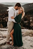I wore this in my engagement pics and it had a lot of movement and was stunning. I was worried about it being too deep V since I'm busty, but was pleased with the coverage! Definitely recommend. - Hailey B.