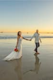 We eloped out in California and this dress was absolutely perfect for it! It arrived in a couple days after ordering, it fit almost perfect but I took it in for alterations. It was a couple inches too long and I added cups to it. Just by doing that I didn't have to wear a bra and it fit just perfect! - Elyssa M.
