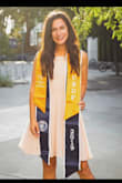 Wore this for my graduation pictures. Love it! Love that it's not see through. The back can take a while to get figured out, I'd recommend having someone do it for you so it looks perfect. - Elisa L.