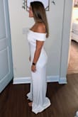 i originally ordered a medium and it was a little snug on my stomach so i sent back and got the large and it fit a lot better. i did have to get the length hemmed because it was a tad too long but all worth it for my rehearsal dress!! with the large i can wear spanx without them showing through. since the medium was so snug i wouldn't have been able to wear my spanx. so aka if you want to cover a little more tum then i would probably go up a size - Victoria P.