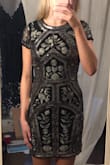 Ill start off saying I probably could have sized down in this dress but then I don't think it would look as classy. This dress is very pretty and can be worn to multiple kinds of events from a night out to a wedding to a holiday party. Its a little long for a short dress but I personally like it that way. Careful of the sequins they seem as though they would pull easily. Nothing bothered me about the fit or the material. Accentuated the little curves I have. I recommend purchasing! - Casey F.