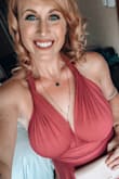 My boyfriend and I were invited to six weddings this year, and this dress was a life saver for me. I could wear it in so many different ways, and the color was BEAUTIFUL and exactly as pictured. It is a bit heavy, so keep that in mind. I didn't even have to get it hemmed (wore 3 inch heels). Also, if you plan to not wear a bra, you might want pasties or petals, as the fabric is thin enough to show when it's... chilly. ;) I got so many compliments and loved that I could tie it to accent my favorite features and hide my least favorite. Highly recommend! - Kandi S.