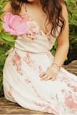 I definitely recommend this dress. It was lower in the chest area than I expected it to be, but still worth it. With the right pair of heels it also is a floor length on me. Love the flow and colors of this dress. 
*bought for my senior pictures - Violet P.