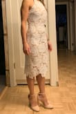 I bought these to go with the Temps De L'Amour White Lace Bodycon Midi Dress for my courthouse wedding ceremony. They go perfectly together! The dress has a nude lining that perfectly matches the color of the shoes. Highest heels I ever bought but it really goes well with that length of dress! - Emma A.