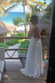 I bought this dress as an impulse buy when it was on sale immediately after my engagement. Even full priced it is still a steal. I thought if I found something I liked more then at least I only spent $200-something. I never found anything I liked more than this dress! It's so well made and definitely looks like it should cost hundreds of dollars more. I just got married last weekend and aside from having to shorten it a little to compensate for not wearing heels, it fit perfectly! - Alexis C.