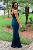 I purchased this dress to wear to a fall wedding. The deep green color was beautiful! The dress fit perfectly; like it was made for me! The material is thick, but not hot or heavy. The neck line is very flattering and I love how the back is scooped a bit. I love the mermaid style fit. Hugged me in all the right places. I sometimes get nervous with ordering dresses online because I'm nervous they are going to be too short for me but this dress offered plenty of length! I wore a shirt heel (maybe 3 inches) with it and still had plenty of length. I typically wear a dress size 4-6 and a medium was the perfect fit. I got so many compliments while wearing this dress; even from strangers in the bathroom! SCORE! You will not be disappointed in this dress! - Natasha S.
