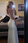 I absolutely love this dress. It fits like a glove without restricting you, and the material is comfortable allowing for free flowing fun movement. I would buy again in another color ... if you're contemplating this dress for any event, go for it! - Alissa B.