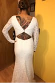 I really love this dress. I seen someone on here added a belt. I attempted to do the same but I'm probably not going to add it. I really love this dress. I'm normally a size 4 in dresses and the small fit perfect. In the photo I'm wearing 4" heels already. - Esmeralda C.