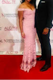 This dress fit my curves perfectly and was comfortable all night.  The dress is definitely floor length. I'm 5'7 and had inches to spare.  I wore it without a bra but could have worn a regular strapless bra. Would recommend! - Raven H.