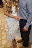 This dress was everything I wanted in an engagement party dress but the sleeves just weren't doing it for me. I took it to my tailor who removed the sleeves and added straps. This dress was so beautiful between the lace and see through panel. I was so pleased with it! I searched many places but did not find a dress as beautiful and well made. - Kristy S.