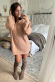 I was nervous about this one. But I am SO glad I took the chance. It's like a cozy/sexy/heavy/soft blanket that you get to wear. It has the perfect amount of weight. A gorgeous drape. And the pink fuzziness of it is so lovely and yet... all that and still somehow I feel sexy in it. I'll be wearing this dress with over the knee boots a lot this winter. - Summer H.