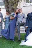 I adore this dress. The dusty blue color is gorgeous and photographs well. I wore it as a bridesmaid and got a ton of compliments. The length was perfect with a small heel. It was light and airy and easy to move in. My only complaint was the top portion was pretty loose and didn't fit well to my chest. It also was hard to find a bra or sticky pads to wear because of the deep v neckline. I just wore sticky nipple guards which worked fine but didn't have the most support. Overall happy with the purchase and would definitely recommend! - Angela Z.