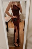 This dress is absolutely stunning in person, the color is perfect. The material is so comfortable, extremely stretchy, and the slit is very flattering! Perfect wedding guest dress for dancing all night.  I probably could have gone with an XS due to how stretchy it is, but it was sold out and the S fits nicely so I'll be keeping it. I am very short so I'm going to get it hemmed (it doesn't touch the ground on me but I want it the same length on the model photos) but other than that it's perfect. If it comes back in stock, buy it! - Vincenza F.
