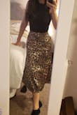Originally ordered a S. It was pretty loose and too long. Ordered the XS and it fits perfect. This skirt is so comfortable and trendy. You can wear it with a blazer to work or going out. So versatile. Would absolutely recommend!! - Katherine L.