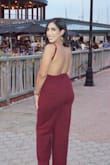 Seriously, this is by far best comfortable jumpsuit ever! The open back is so flawless, adjustable straps! I would recommend wearing some kind of platform, it has a beautiful wide leg! The material feels expensive but without the price tag! I wore it for a wedding and got so many compliments! - Paola B.