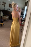 This dress is amazing! I didn't realize it has the spec design on it and I loved it. Super comfy and super sexy with the slit. It was also perfect length with heels on. Would definitely recommend! - Sarah S.