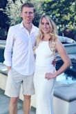 I received so many compliments when I wore this dress to my engagement party - everyone thought that it was a wedding dress! It's absolutely stunning and is a nice material too. Definitely would buy this in other colors if available. - Mallory M.