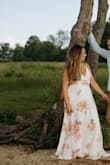 I fell in love with the dress but I found that the bust measured way too small and tight. It felt tight and kept popping open throughout my engagement session.  The length of the dress was extremely long for me even with 3 inches. I had used a ton of dress tape to secure the fabric around my cheat and a sticky bar to make it work for me. Photographs beautifully! - Jessica L.