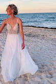 I am in love! I had alterations to make the straps shorter and hem the bottom, will update review with a pic after I wear it for my wedding! - Nicole M.