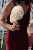I only leave reviews when I LOVE something and here was another W! Fit so well- plenty of stretch but still looked quality. Perfect for a fall wedding in the burgundy color- classy and a bit sexy. I wore pasties with it to keep my cleavage minimal but can be worn with a plunge bra. Similar to other reviews, the slip under isn't sewn totally in so at times moved up but not really bothersome. Slit comes up a bit high when sitting but overall, LOVED this dress and got a ton of compliments. - Jenna D.
