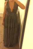 If you are looking for a scandalous yet sexy and elegant, this is your dress. I got a small but had to return it. I have a curvy type of body, skinny top and big hips so I got a small and for the breast area, it worked but felt very tight when zipping the waist area. Also, the dress is extremely long (I'm 5'4") so to wear it I would've had to chop more than 4 inches of the dress. - Ivelisse J.