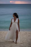 Loved this dress as my second wedding dress to wear to our reception dinner. The dress was super comfortable and flowy. I felt like a goddess. I did have the dress hemmed (it's long) and the bust and straps altered so I had better cleavage without worrying about a boob popping out. Highly recommend this dress! - Lindsey M.