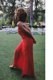 The color is stunning in person. I have an athletic build (broader shoulders and back) so a medium is a safe buy. It's a bit loose which kept it flowing. I felt so pretty in this. I never knew red was my color. - Linzy K.
