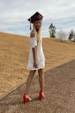 It's a cute dress that flows in the wind, and perfect for my graduation pictures! - Raquel R.