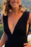 This is the most perfect gown - comfortable, formal, and classic with a little bit of sexy! I am 5'4" and almost 130lb, athletic build with a small bust. It fit perfectly with 4" heels and no need for alterations. I received so many compliments at the black tie wedding that I attended. And I would definitely buy this dress again. - Aimee B.