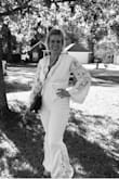 I bought this to get eloped and I Couldn't be more satisfied. I love this jumpsuit... stretchy, slimming, comfortable, and finally a white jumpsuit that you can't see through. I have thick legs and thighs so i wouldn't consider it wide leg unless you have skinny bird legs, but since I loved so many things else about this jumpsuit, I decided i just needed to add a few features. I added on bell sleeves, bell bottoms and bordered lace fabric around the inside of the holder top. I love the way it turned out - Alex B.