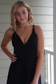 My daughter wore this dress to her winter formal and it was perfect. We did have bra cups sewn-in, the straps sewn together in the back on the shoulder because the one strap was uncomfortable and fell down and we slit the lining under the skirt to lay better because it crawled up my daughters thighs.

I know it seems like a lot we changed, but it was simple alterations. The dress was perfect. - Jennifer F.