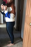Absolutely love this sweater. It's super cozy- perfect for winter get togethers. It's a shorter cut which I love. I'm 5'1 and it hits right around my hips. I got an XS which I normally get when buying flowy tops and it fits as expected. I may need to purchase the other color! :) - Jenn M.
