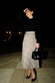 This is the kind of skirt that you can use for almost any occasion. It is flowy, the fabric is high end, the length is extremely classy, and the pleats look beautiful. I dressed it up with the LULUS "Early to Rise Black Handbag". All my measurements are saved on Lulus for those who need a reference in sizing. Honestly if you're looking for the perfect holiday skirt, look no further, this is IT. - Lorena R.