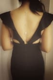I wore this dress for my company's holiday party and WOW, I loved it! I don't mean to brag, but I'm pretty sure I had the best dress there haha. Great quality, fully lined, hugs in all the right places, adds curves, elegant and sexy at the same time!

I had it hemmed and used double-sided tape to avoid flashing people. A dangly necklace down the back added the perfect touch.

Very happy with it! - Nancy B.