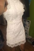 I purchased an xs and it's perfect. Not too tight or too short. Saw the same dress at Nordstrom for a lot more. - CHARMAINE F.