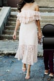 This dress is absolutely gorgeous!  It's very flattering as well.  Absolutely love it. - Tina S.