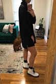 I'm usually between a small and a medium and read that it runs a little big, so ordered a small. It fits great! It's on the shorter side since I have long legs, but still appropriate. Arms are fitted but not uncomfortable. I think I'm going to wear it a lot this fall!! So excited! - Clarke L.