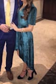 Love the fit of this dress so much!! Received many compliments! Perfect for a fall/winter wedding! I usually buy a small, but since it was a wrap style the XS was perfect! - Dana W.