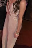 In just jumpsuits I wear a small at Lulus. This one tends to be more "stretchy." Also, the small was big in the chest area & back. But a safety pin worked fine! Definitely could've used an XS! - Dana W.
